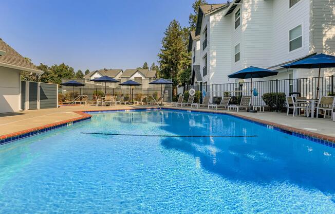 a pool next to a body of water