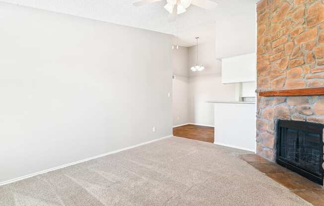 Living Room at Terrace at Bookstone and Terrace Apartments in Irving, Texas