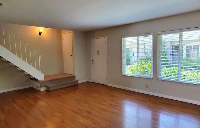 Spacious 2-Story Townhome, Fresh Paint, New Carpet, Wood Floor Downstairs, Patio, Dual Pane, Washer/Dryer Hookups!