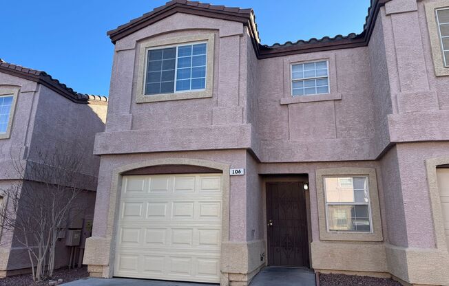 Townhome featuring stylish layout in gated community.