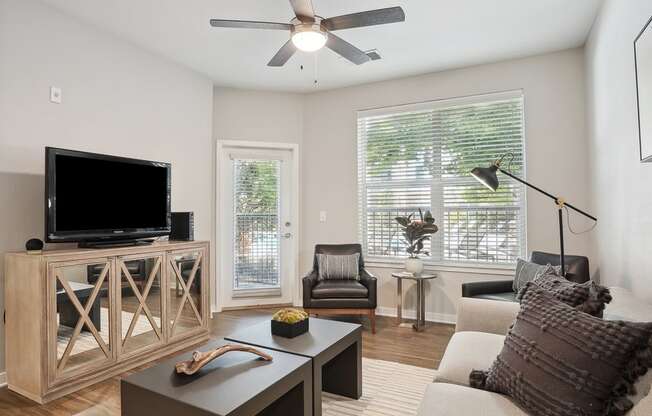 a living room with a couch and a tv