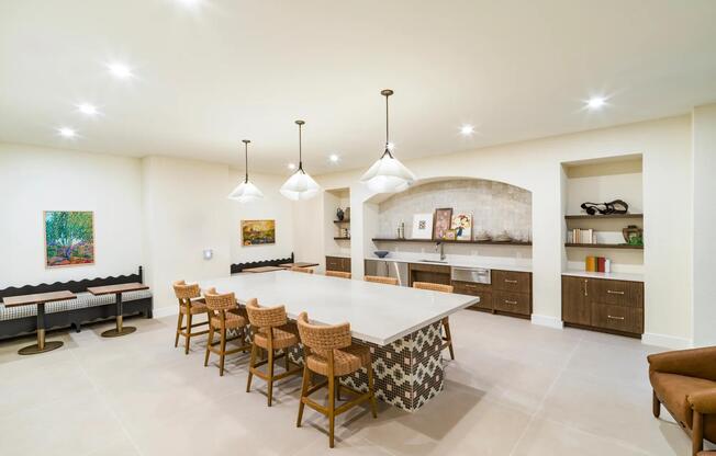 Host with ease in Modera Trailhead’s stylish resident lounge, featuring a chef-inspired kitchen and spacious seating for gatherings.