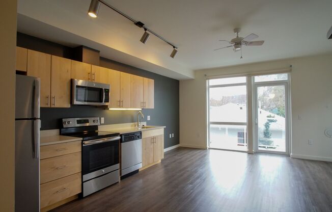 Slabtown: Rare 1 Bed + Den AND Balcony!