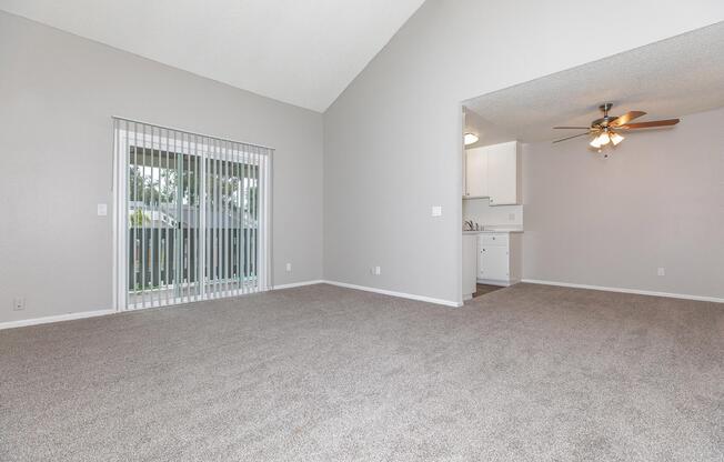 a bedroom with a large window