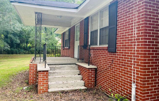 3 bedroom, 1.5 all brick ranch with 2 car garage in College Park! Must see!