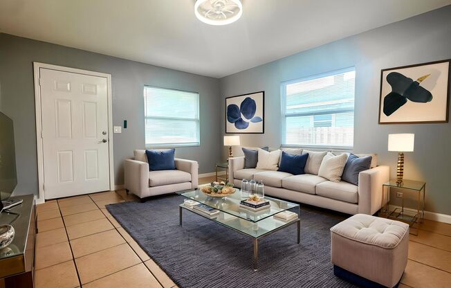 Feel right-at-home in this light-filled 2BR/1BTH with private yard!
