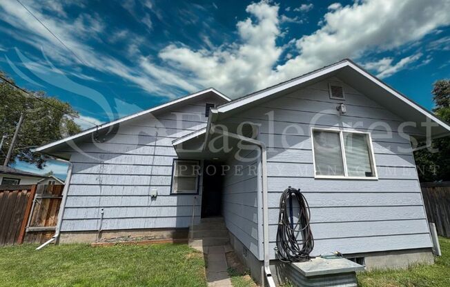 Three Bedroom, Two Bathroom House with Fenced Yard and Outdoor Fireplace