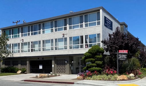 Front of 3655 colegrove Apartments a building with large windows facing the street side