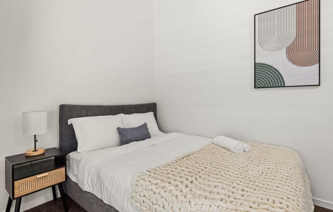 A 4 bedroom, 2 bathroom apartment with common areas and a fully functional kitchen at 1823 Pelham Ave. Unit #7