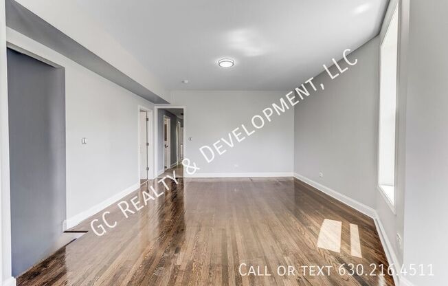 6433 S VERNON AVE
