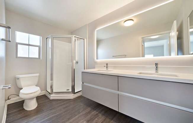 Boulevard on Wilshire Large Bathroom with Double Vanity and Walk In Shower