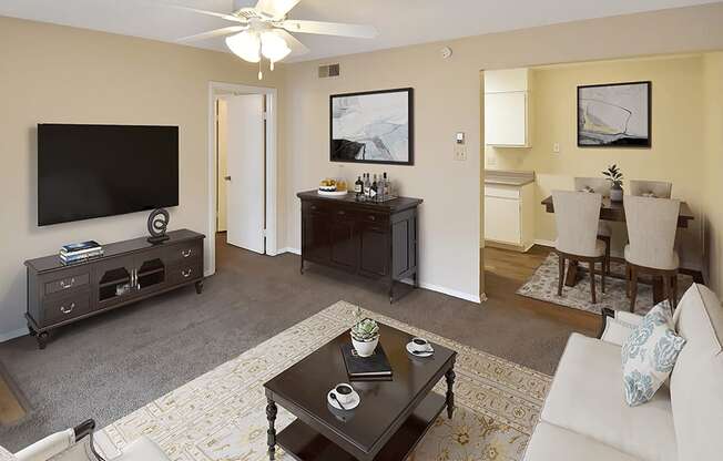 a living room with couches and a coffee table