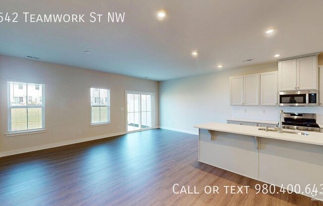 9542 TEAMWORK ST NW