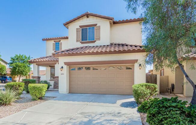 Spacious 4 bedroom home with full bath and bedroom downstairs