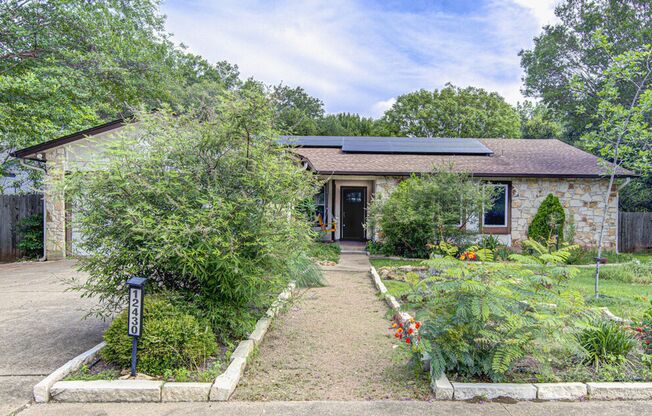 Freshly Updated 4 Bed Home with Solar Panels & Incredible Native Landscaping