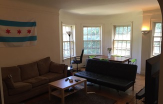 a living room with two couches and a coffee table