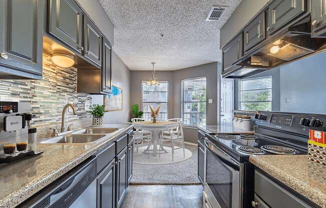 kitchen with updated appliances at summit on the lake apartments