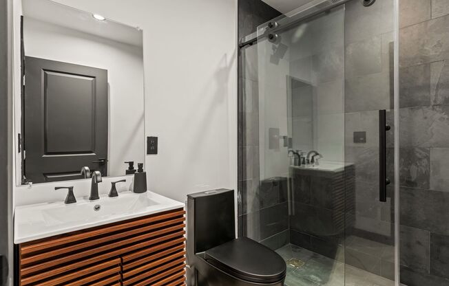 A 4 Bedroom, 3 Bathroom apartment with common areas and a fully functional kitchen at 1476 Malcolm Ave.