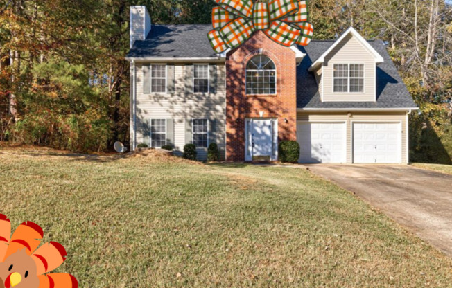 Welcome to this lovely 3-bedroom home with FULL STAINLESS APPLIANCES AT MOVE-IN in Douglasville, GA!