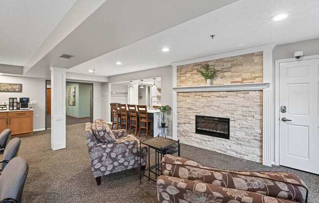A living room with a fireplace and a couch.