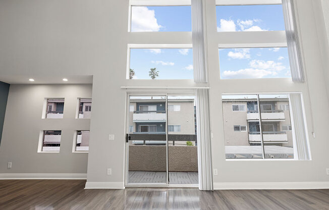 Floor to ceiling window view of Hughes Regency courtyard.