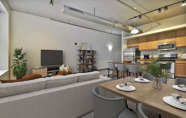 a view of the living room and kitchen from the dining room