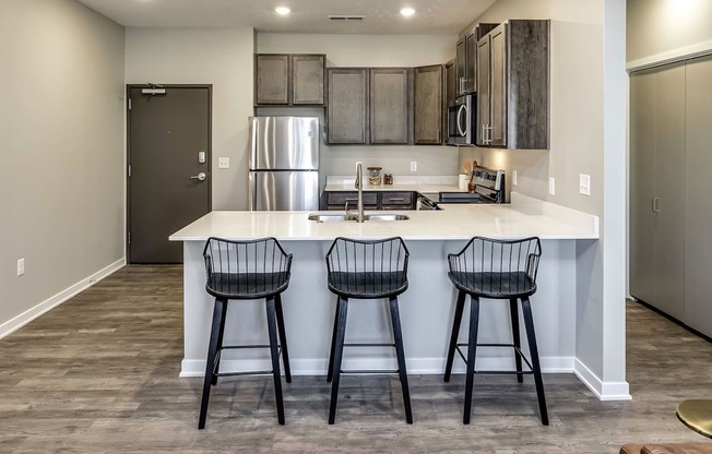 Kitchen with bar at Hanover Flats in Bennington, NE