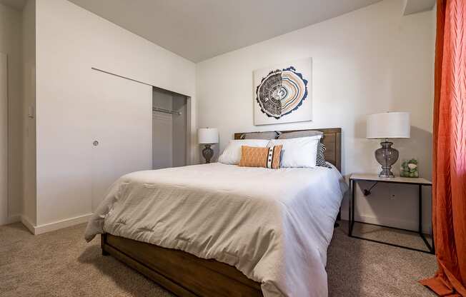 bedroom with large bed and closet