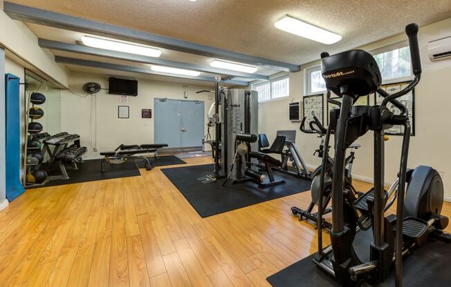 Apartments in Marina Del Rey, CA - Casa De Marina - Fitness Center with Olyptical Machine, Free Weights, and Yoga Mats