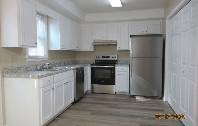 Newly renovated-2 bed/1.5 bath townhouse- Lawn Maintenance included