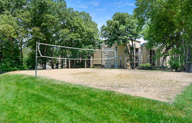 the volleyball court is in front of the building