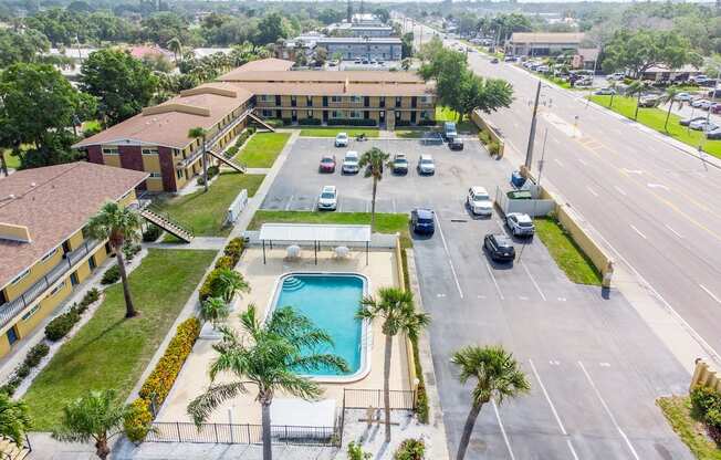 a view of the pool and the building from above