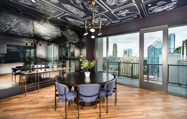 Enter the private dining lounge at Modera Old Ivy, where dramatic design, city views, and polished interiors set the tone for memorable gatherings.