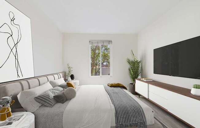 A modern bedroom with a large bed and a flat screen TV mounted on the wall.