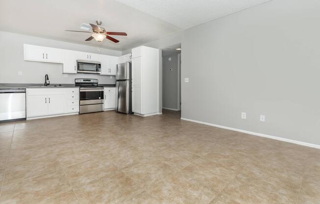 a kitchen with a wooden floor