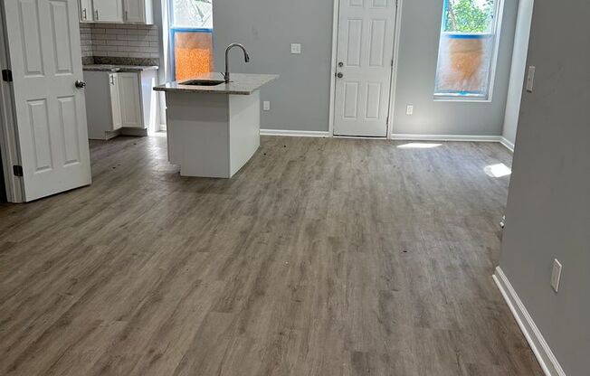 Brand New Renovation! Open Floor Plan! W/D! Central Air! Front Porch! Rear Deck! Close to Public Transportation!