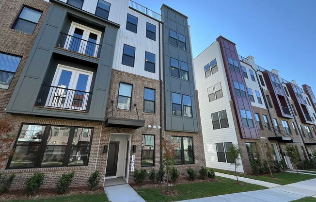 **OFFERING FIRST MONTH'S RENT FREE, $200 MOVE IN PROMOTION & WAIVED APPLICATION FEES** New Construction 3BD, 2.5BA Raleigh Townhome-Style Condo with 1-Car Attached Garage & Rooftop Terrace in Downtown Raleigh