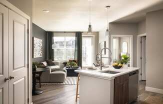 a kitchen and living room in a home