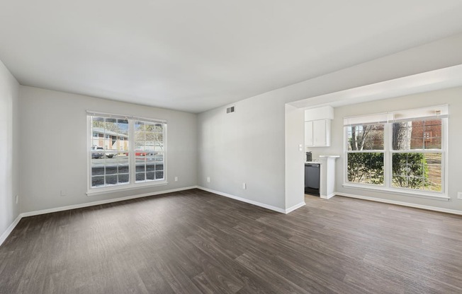 A room with a window and a door.