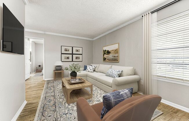 a living room with a couch and a coffee table