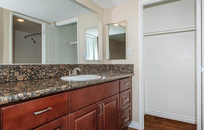 a kitchen with a sink and a window