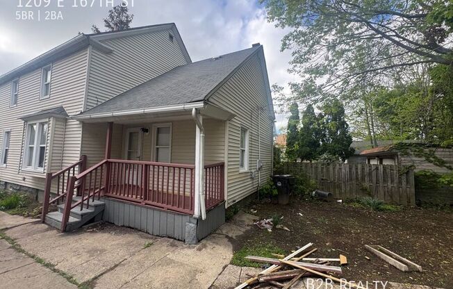 1209 E 167 ST