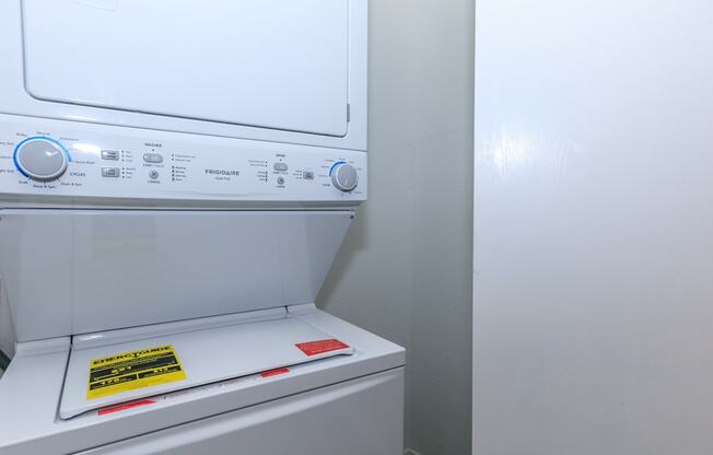 a white washer and dryer in a laundry room at Tides at Mesa, Arizona