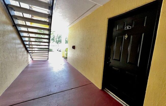MOVE IN NOW!! Gated community Miriada! 1st floor 1X1.5 bath condo near pool area!!! Laminate wood flooring in living area and carpet in bedroom! Has washer & dryer! Gas stove & water heater!