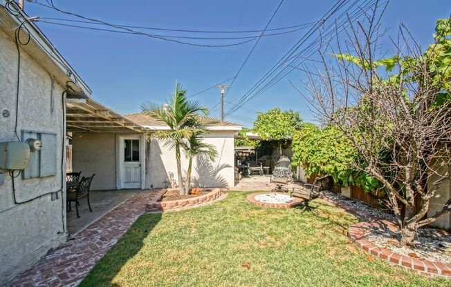 PARTIALLY REMODELED, SPACIOUS & BRIGHT, 4BR2BA HOME IN QUIET RESIDENTIAL NEIGHBORHOOD CLOSE TO SCHOOLS, PARKS, EASY FREEWAY ACCESS & 5 MINS TO BEACH!