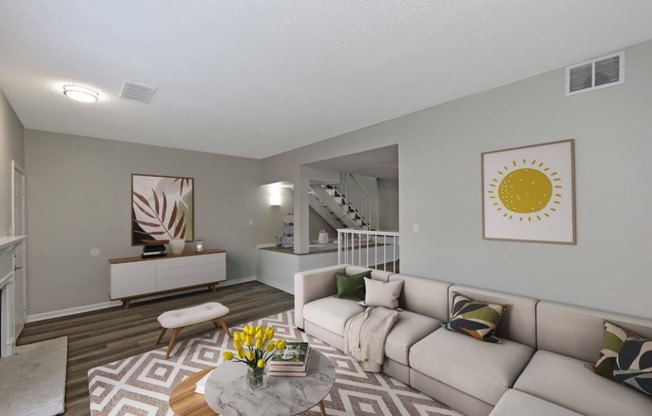 our apartments offer a living room with a couch and a coffee table