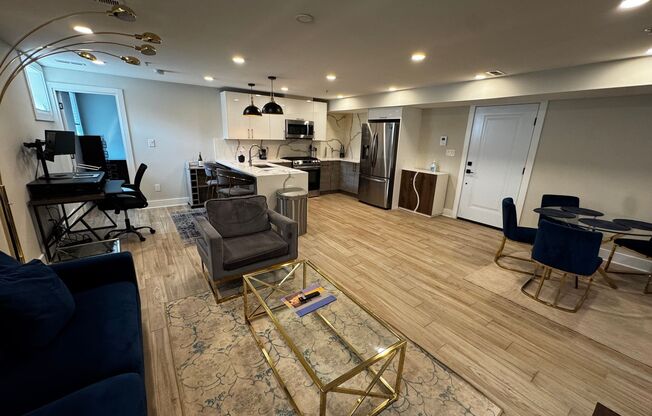 Discover this beautifully renovated 2BD/2BA FULLY FURNISHED condo in the vibrant Carver/Langston neighborhood