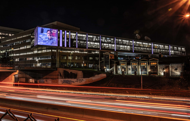 Corner of WGBH billboard lit up at night