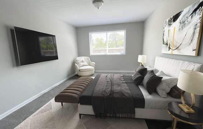 Bedroom with TV set at Flats of Forestville, Forestville, Maryland