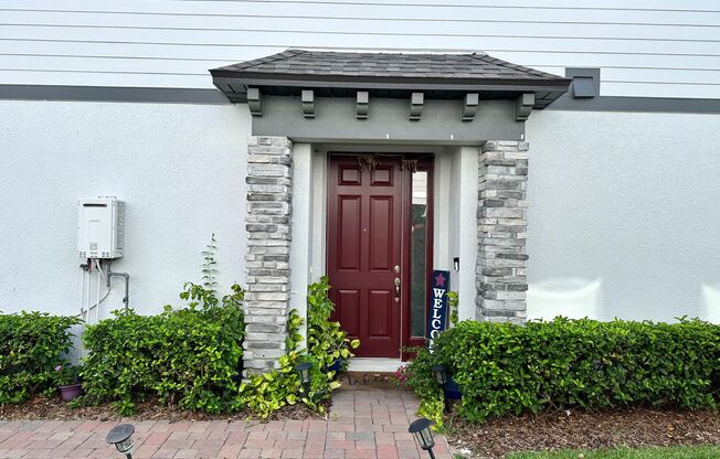 Lease this 3BR End-Unit Townhome in Gated Community with Water View!